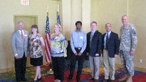 Chapter members and science fair winners joining together in June are (l-r) Gen. Rayburn; Karin Smith, first place Junior Division winner; Den Wilkins, Senior Teacher of Merit winner; Ravi Gaddipati, second place Senior Division winner; John Parish, third place Senior Division winner; Ares Koumis, Science Fair point of contact; and Col. Michael Curry, USA, chapter president.